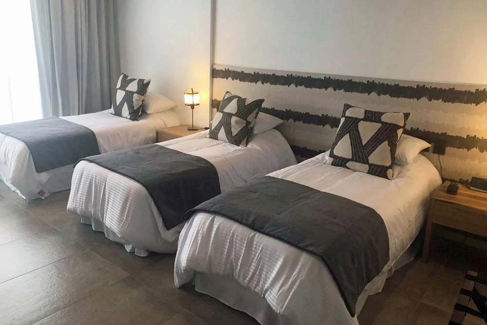 Chambre triple à 3 lits de l’hôtel O2 Iguazu en Argentine